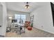 Bright home office with a modern desk, and an adjustable, cushioned chair at 5626 Wyncreek Sw Cir, South Fulton, GA 30331
