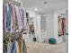 Spacious walk-in closet with custom shelving, and ample storage for an extensive wardrobe at 5626 Wyncreek Sw Cir, South Fulton, GA 30331
