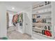 Spacious walk-in closet with custom shelving, and ample storage for an extensive wardrobe at 5626 Wyncreek Sw Cir, South Fulton, GA 30331