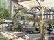 Scenic backyard featuring a tranquil pond and lush landscaping at 8806 Clear Creek Ct, Douglasville, GA 30135