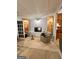 Finished basement with built-in shelving and comfortable seating at 8806 Clear Creek Ct, Douglasville, GA 30135