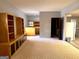 Spacious basement with built-in shelving and bar area at 8806 Clear Creek Ct, Douglasville, GA 30135