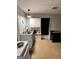 Small basement kitchen with sink and cabinets at 8806 Clear Creek Ct, Douglasville, GA 30135