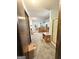 Bathroom with double sinks, wood cabinets, and a standup shower at 8806 Clear Creek Ct, Douglasville, GA 30135