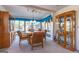 Bright dining room with a round table and built in cabinetry at 8806 Clear Creek Ct, Douglasville, GA 30135