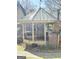 Exterior view of gazebo, highlighting its construction and brick chimney at 8806 Clear Creek Ct, Douglasville, GA 30135