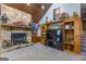 Spacious living room with stone fireplace, vaulted ceiling and entertainment center at 8806 Clear Creek Ct, Douglasville, GA 30135