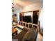 Basement living room with large TV and built-in shelving at 8806 Clear Creek Ct, Douglasville, GA 30135
