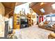 Living room with vaulted ceiling, skylights, and leather couches at 8806 Clear Creek Ct, Douglasville, GA 30135