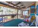 Cozy screened porch with seating and outdoor views at 8806 Clear Creek Ct, Douglasville, GA 30135