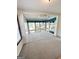 Cozy sun room with large windows and bright blue curtains at 8806 Clear Creek Ct, Douglasville, GA 30135