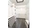 Walk-in closet with carpet, white shelving, and shoe storage at 8806 Clear Creek Ct, Douglasville, GA 30135