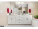 Bathroom showing the double sink vanity with white cabinetry at 600 English Ct, Mcdonough, GA 30252