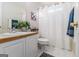 Clean bathroom with white cabinets and a shower/tub combo at 600 English Ct, Mcdonough, GA 30252