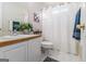 Traditional bathroom features a white vanity and tile floors at 600 English Ct, Mcdonough, GA 30252