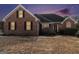 Brick house with landscaping and a walkway at 600 English Ct, Mcdonough, GA 30252