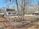 House with chain link fence and large backyard at 140 Harris Dr, Mcdonough, GA 30252