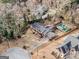 Aerial view of house, pool, and surrounding trees at 5546 Stoneybrook Se Ct, Mableton, GA 30126