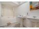 Basement bathroom with double vanity at 5546 Stoneybrook Se Ct, Mableton, GA 30126