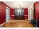 Dining room with hardwood floors, chandelier, and built-in hutch at 5546 Stoneybrook Se Ct, Mableton, GA 30126
