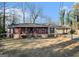 Red brick ranch house with mature trees at 5546 Stoneybrook Se Ct, Mableton, GA 30126