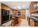 Spacious kitchen with an island, ample cabinetry, and granite countertops at 5546 Stoneybrook Se Ct, Mableton, GA 30126