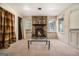 Cozy living room with a stone fireplace and hardwood floors at 5546 Stoneybrook Se Ct, Mableton, GA 30126