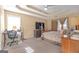 Primary bedroom featuring carpet floors, a queen bed, large windows and a ceiling fan at 2618 Windage Sw Dr, Marietta, GA 30008