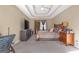 Primary bedroom featuring carpet floors, a queen bed, large windows and a ceiling fan at 2618 Windage Sw Dr, Marietta, GA 30008