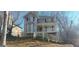 Two-story home featuring a welcoming front porch and well-maintained landscaping on a generous lot at 2618 Windage Sw Dr, Marietta, GA 30008