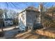 Two-story home featuring an attached garage and wooded surroundings at 2618 Windage Sw Dr, Marietta, GA 30008