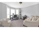 Inviting living room with plush seating, neutral walls and lots of natural light at 2618 Windage Sw Dr, Marietta, GA 30008