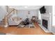 Bright living room with hardwood floors, neutral walls and a cozy fireplace at 2618 Windage Sw Dr, Marietta, GA 30008