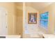 Bathroom with soaking tub, shower, and window at 4408 Idlewood Park, Lithonia, GA 30038