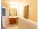 Bathroom with vanity, sink, and walk-in closet at 4408 Idlewood Park, Lithonia, GA 30038