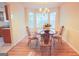 Charming dining room with wood floors and a bay window at 4408 Idlewood Park, Lithonia, GA 30038