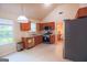 Well-lit kitchen with stainless steel appliances and ample cabinet space at 4408 Idlewood Park, Lithonia, GA 30038