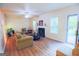 Bright living room features a fireplace and access to a back patio at 4408 Idlewood Park, Lithonia, GA 30038