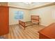 Spacious main bedroom with wood floors and ceiling fan at 4408 Idlewood Park, Lithonia, GA 30038