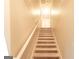 Simple staircase leading to the upper level at 4408 Idlewood Park, Lithonia, GA 30038