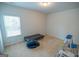 Bedroom with futon and window with blinds at 430 St Annes Pl, Covington, GA 30016