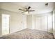 Spacious bedroom with neutral carpeting and ceiling fan at 6527 Arbor Gate Sw Dr # Bldg 12, Mableton, GA 30126