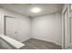 Simple bedroom with hardwood floors and neutral walls at 6527 Arbor Gate Sw Dr # Bldg 12, Mableton, GA 30126