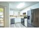 Modern kitchen with stainless steel appliances and white cabinets at 6527 Arbor Gate Sw Dr # Bldg 12, Mableton, GA 30126