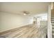 Spacious living room with light gray walls and wood-look flooring at 6527 Arbor Gate Sw Dr # Bldg 12, Mableton, GA 30126
