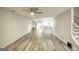 Spacious living room with light gray walls and wood-look flooring at 6527 Arbor Gate Sw Dr # Bldg 12, Mableton, GA 30126
