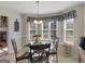 Breakfast nook features a glass table and bay window views at 1429 Empress Dr, Mcdonough, GA 30253