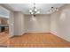 Simple dining room with hardwood floors and a chandelier at 165 Deer Forest Rd, Fayetteville, GA 30214