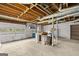 Unfinished basement garage with storage shelving at 200 Old Stagecoach Dr, Stockbridge, GA 30281