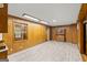 Dining area with wood paneling and flooring at 200 Old Stagecoach Dr, Stockbridge, GA 30281